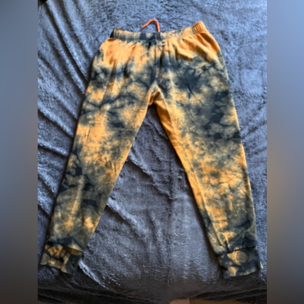 Men’s orange and black tie dye champion sweatpants